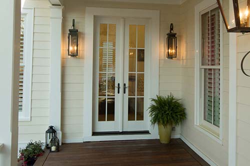 White siding around front door