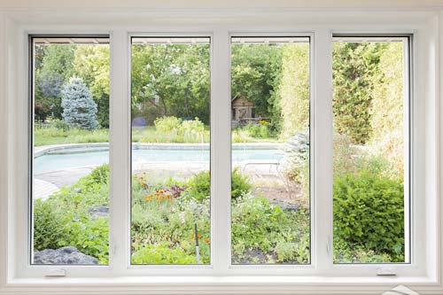 Closeup of white paned 4 panel window.